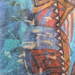 wrap-style cardigan sweater from the Italian fashion brand Save The Queen!. The